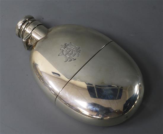 A late Victorian silver oval hip flask, Sampson Mordan & Co, London, 1895, 13.4cm.